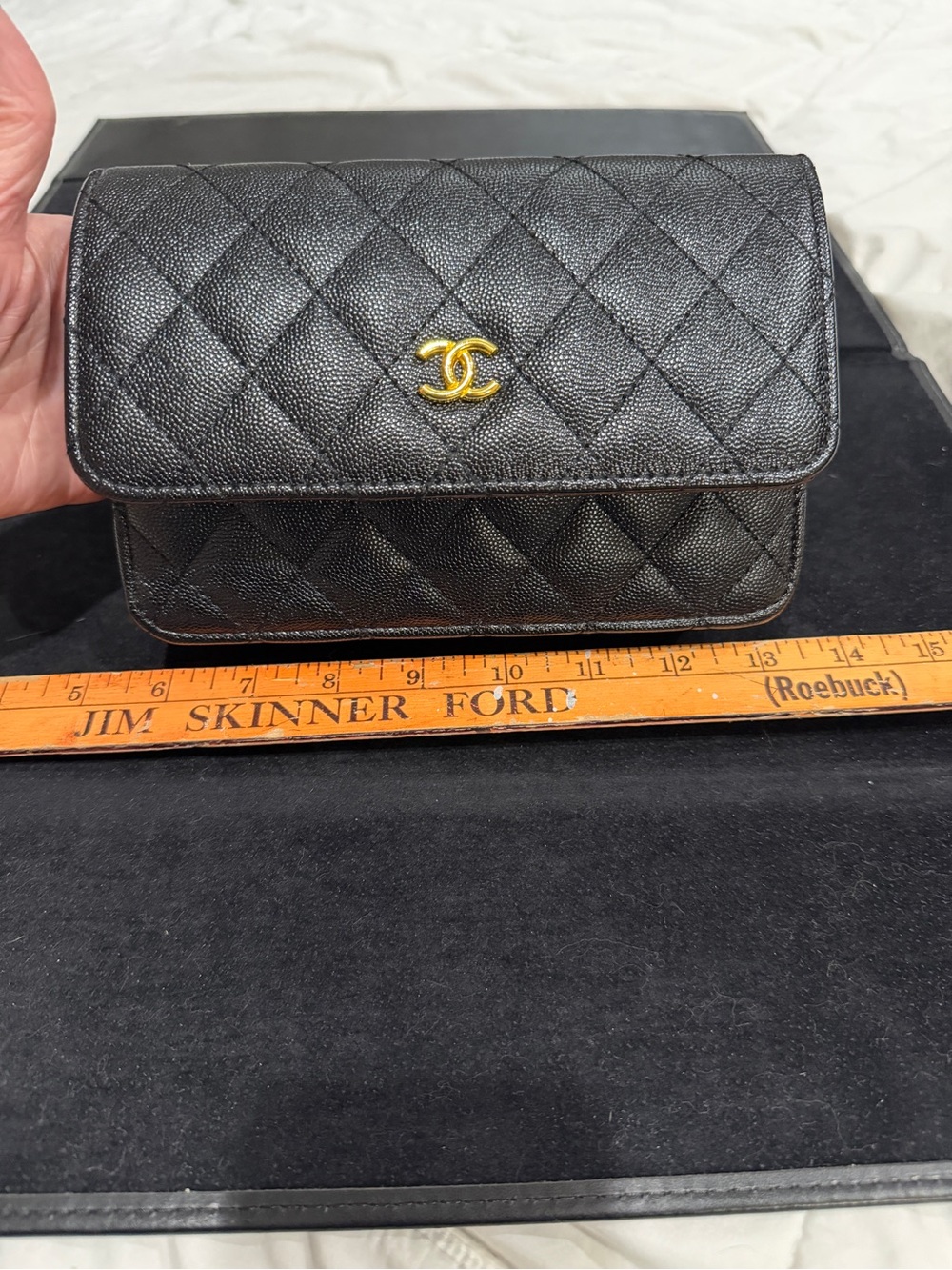 CHANEL Black Quilted Caviar Leather Mini Flap with Gold CC